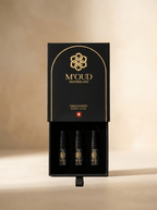 M'OUD Discovery Set — open box revealing three labelled oud extrait vials